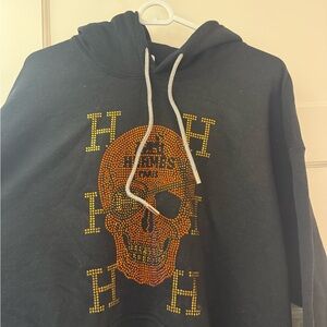 Black Hoodie with Hermes Skull Design